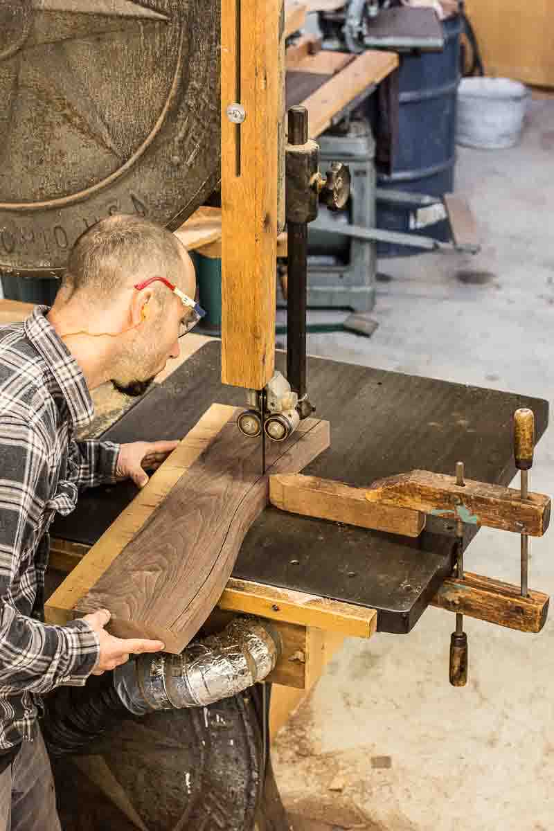 Aaron sawing a rocking chair splat