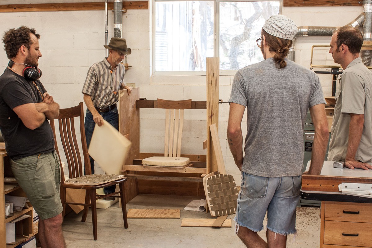 The company evaluating the chair fitting booth.