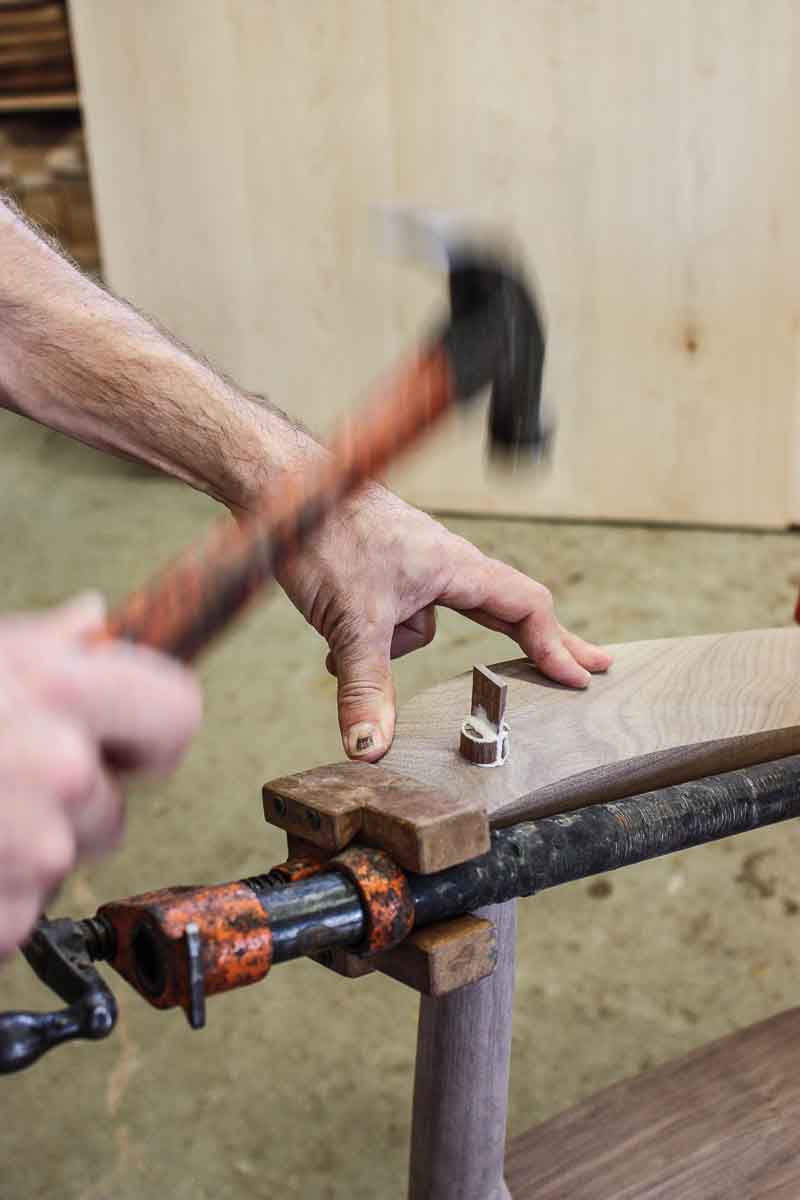 driving a wedge to secure a through tenon 3