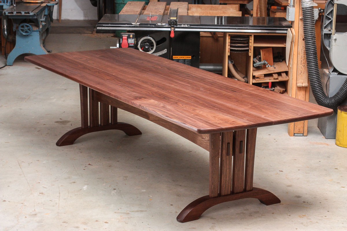 twelve foot long Mitchell trestle table in shop