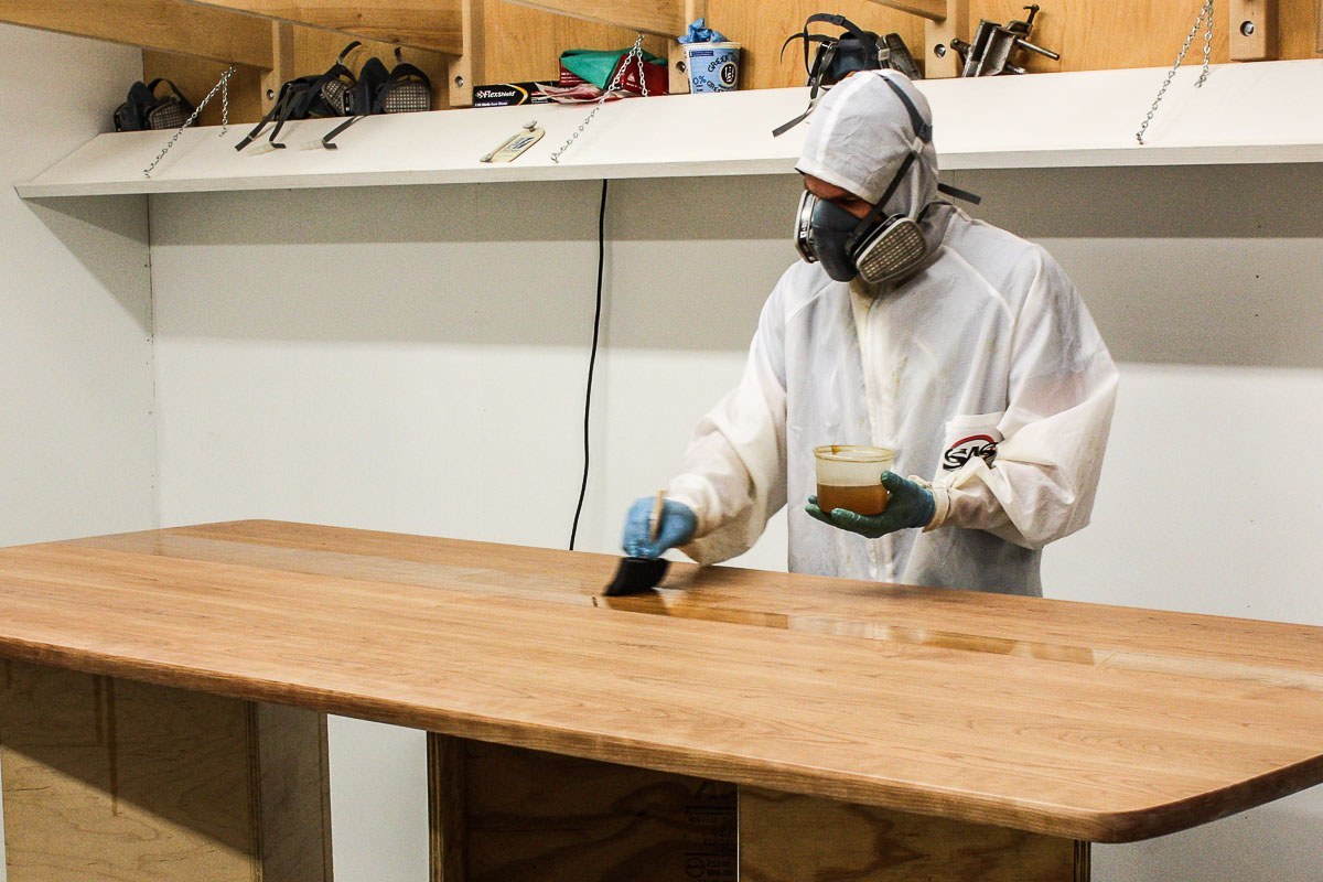 Austin varnishing a Mitchell table top
