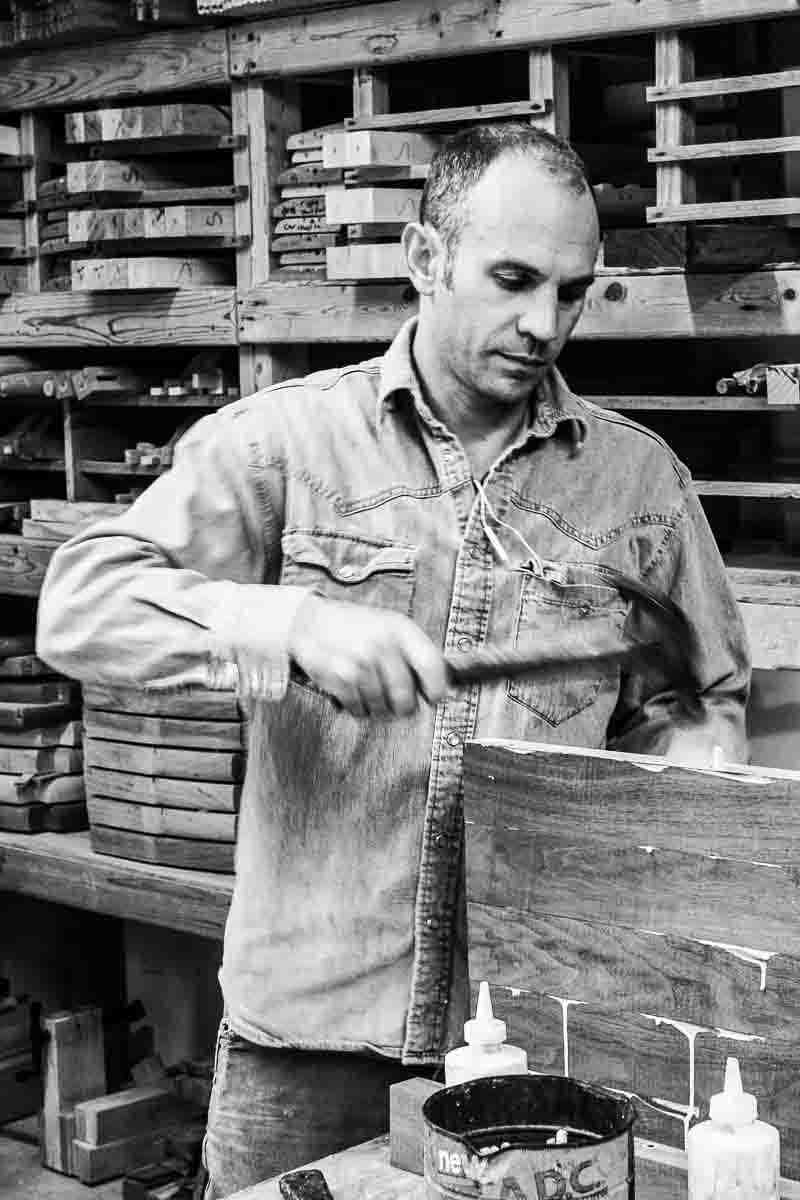 Austin driving dowel pins to laminate a rocker seat