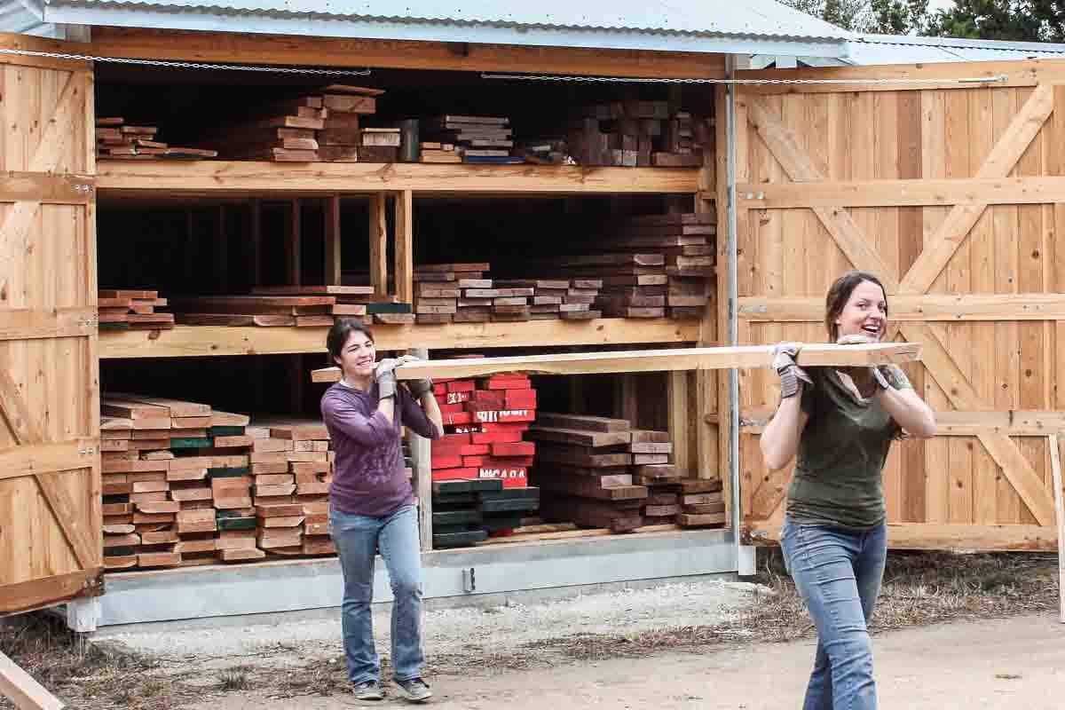 carrying lumber from shed to shop