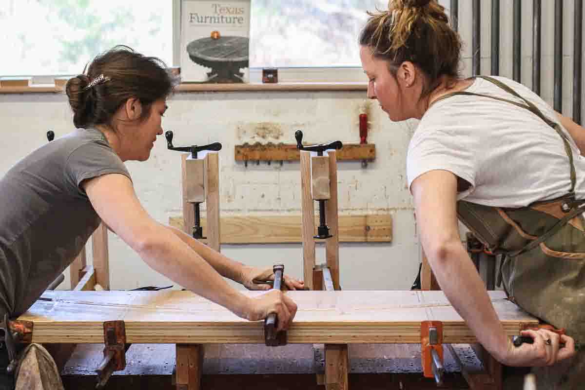 Audra and Autumn clamping the laminations