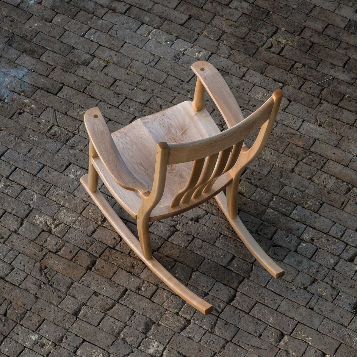 Hard Rock Maple Rocking Chair on bricks