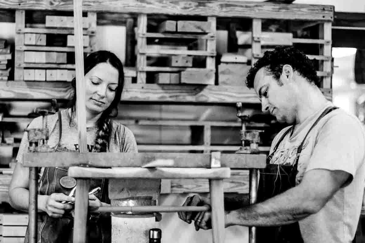 Autumn and Will assembling a dining chair