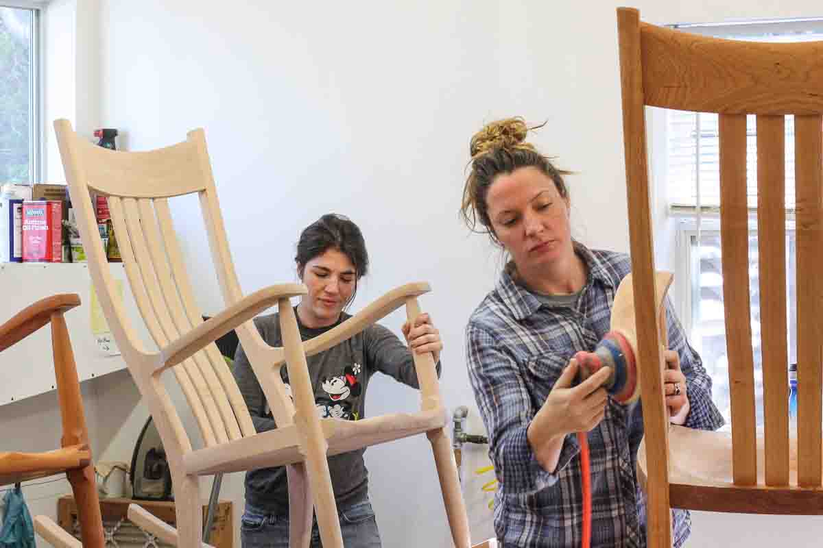 Autumn and Audra oiling and polishing rocking chairs
