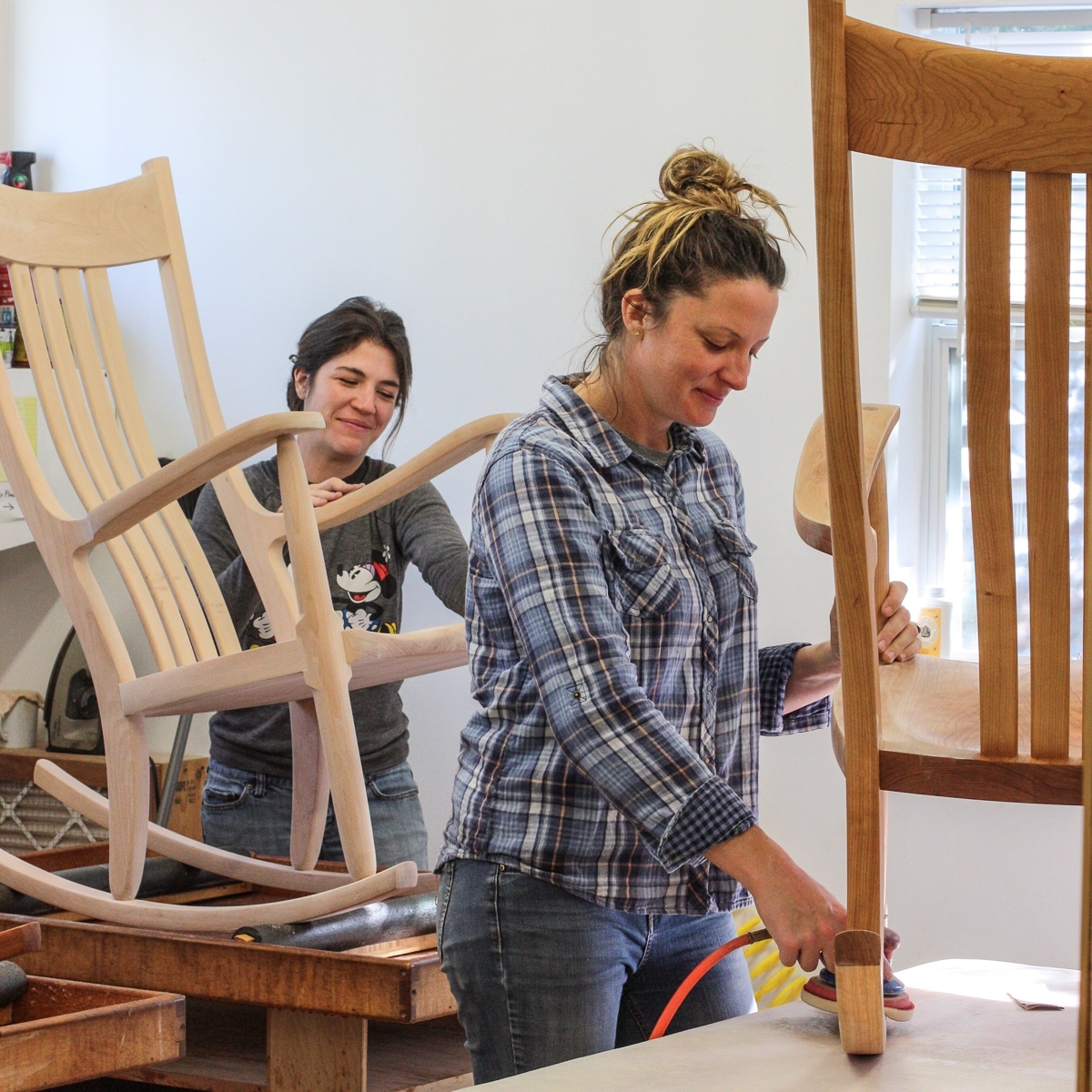 Audra sanding, Autumn polishing rocking chairs