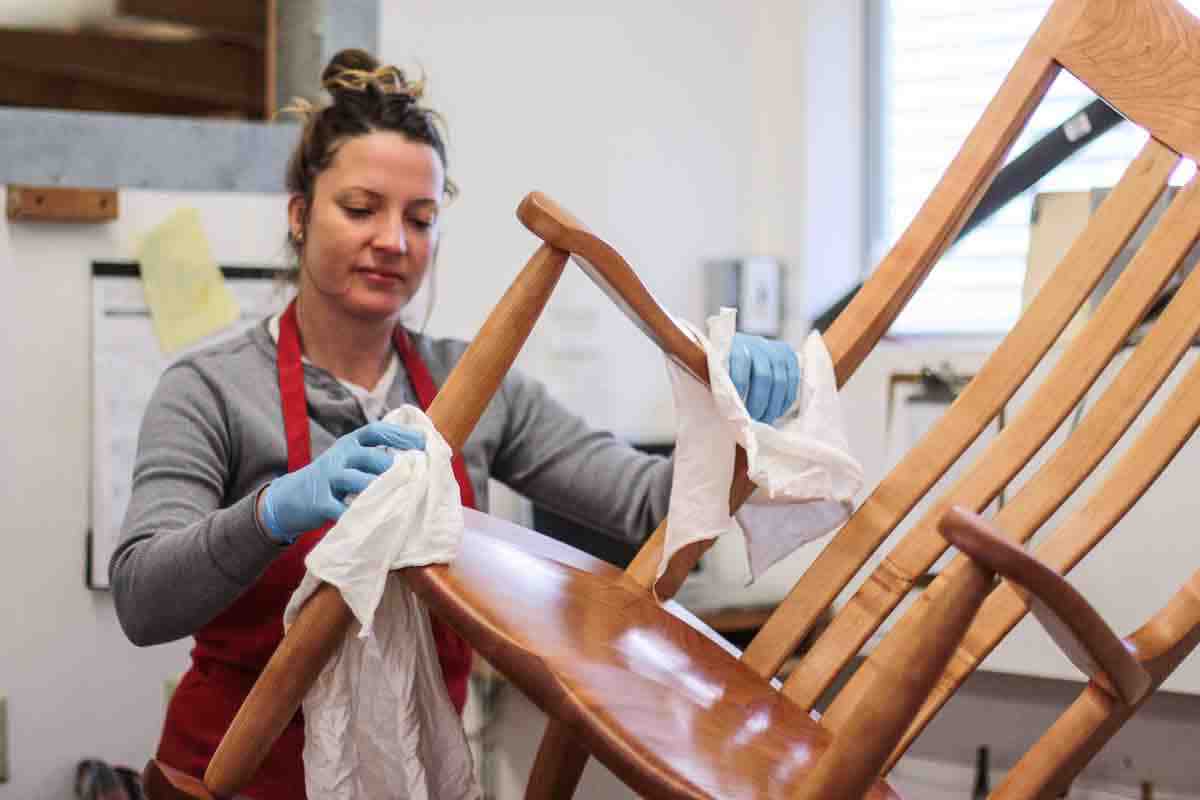 Autumn oiling a cherry rocking chair