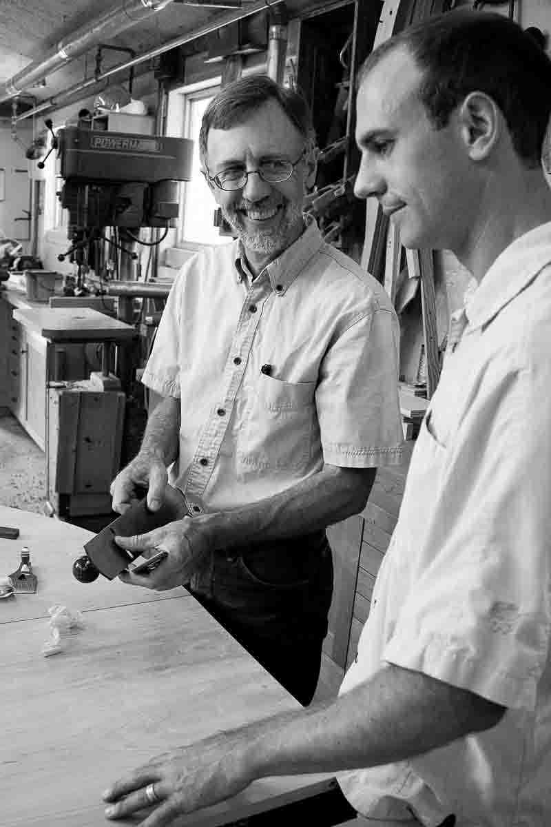Gary and Austin planing a table top