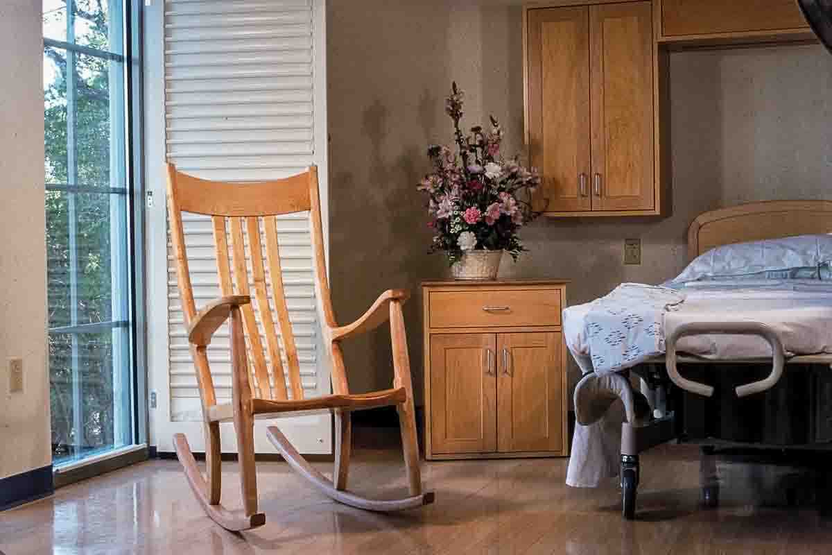 maple rocking chair in hospital birthing room