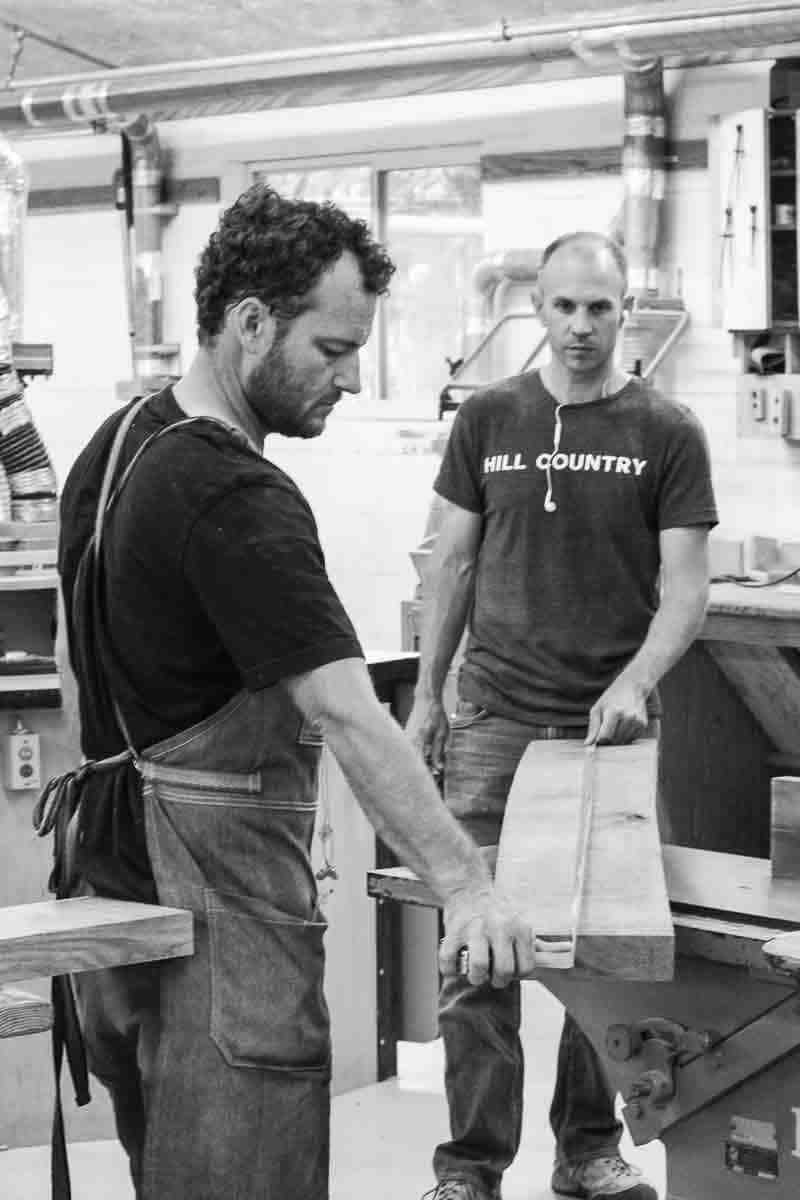 Will and Austin measuring a board