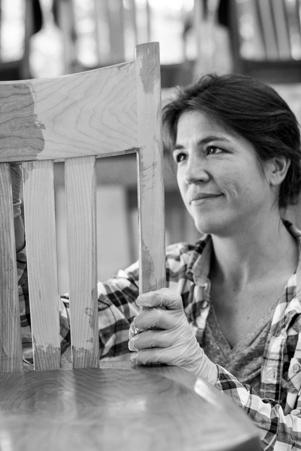 Audra finishing a barstool