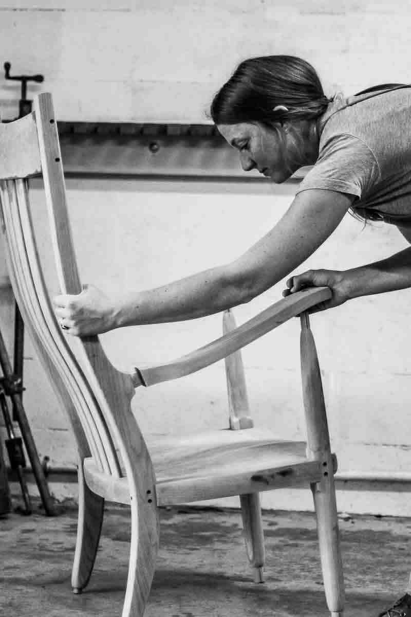 Autumn putting arm on a rocking chair