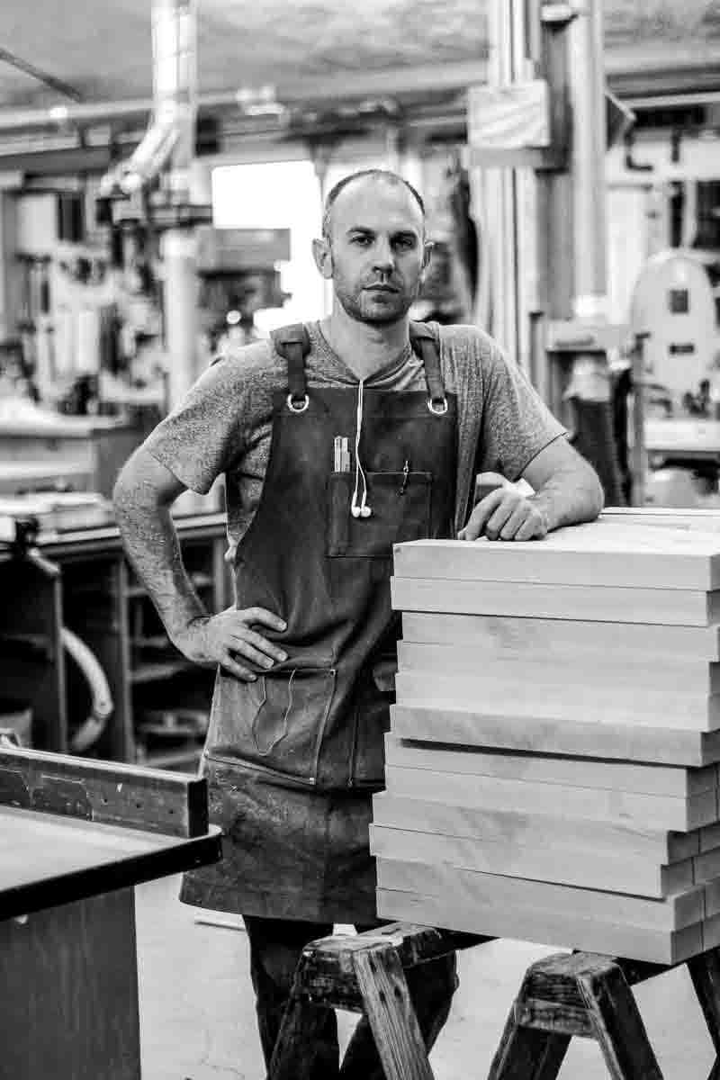 Austin and a stack of rocker seats