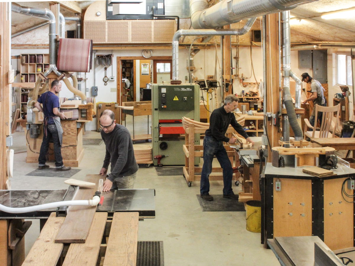 Craftsman in the shop making chairs