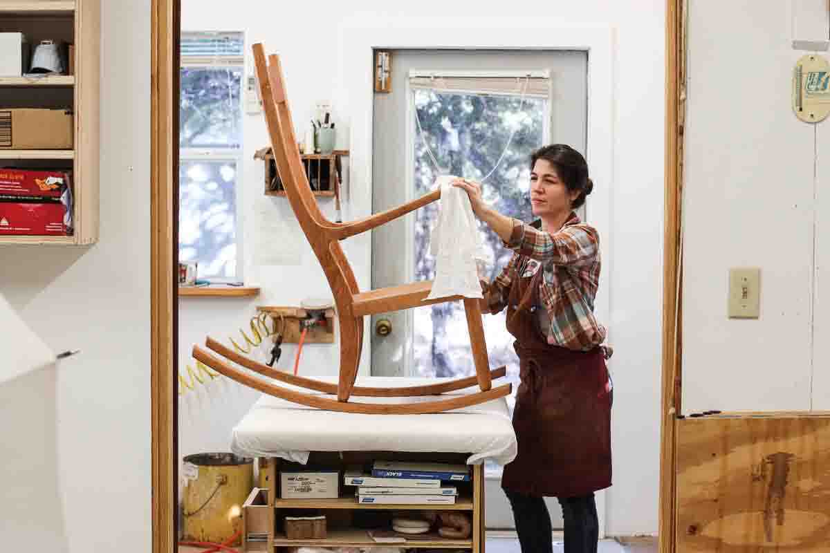 Audra drying a cherry rocking chair