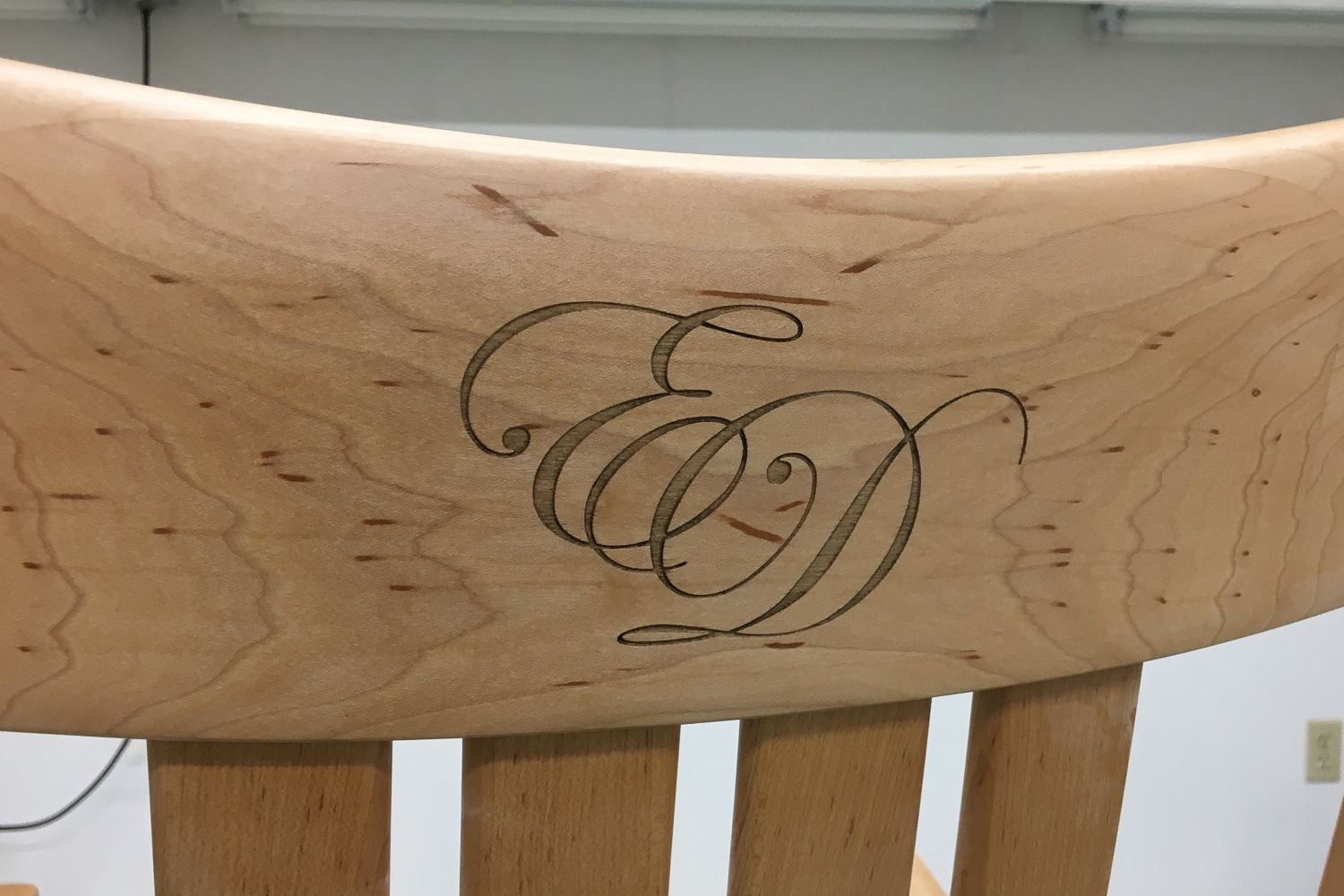 rocking chair crest engraved with initials