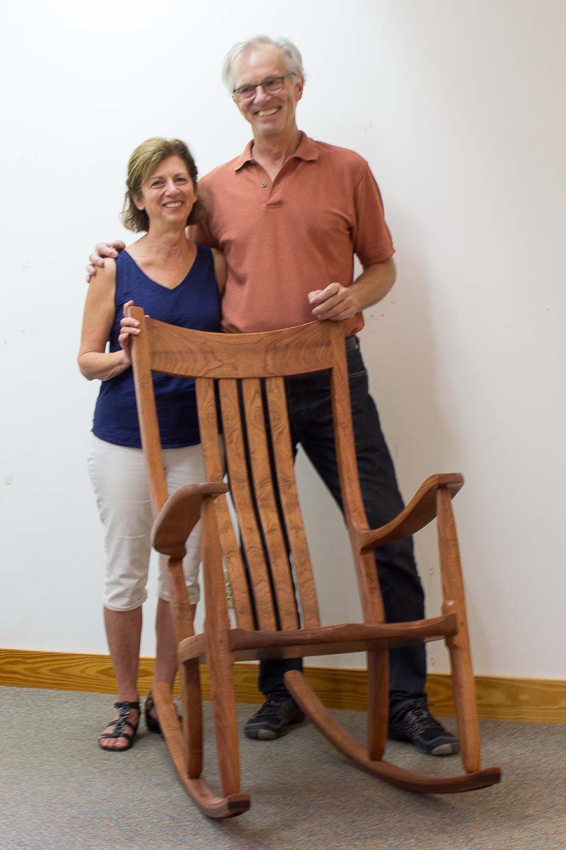 couple, short and tall, with rocker