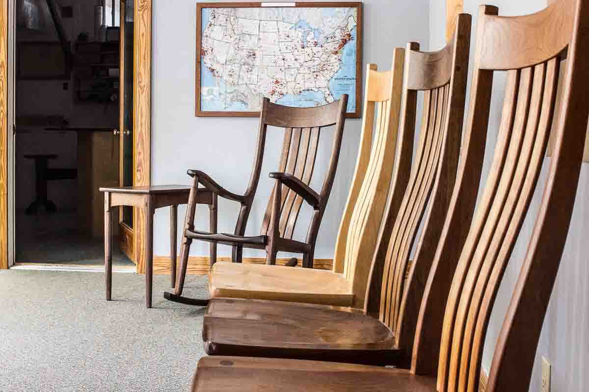 a row of chairs in the showroom