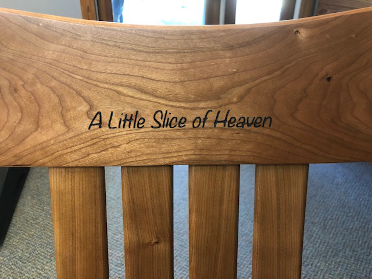 engraved chair back with saying