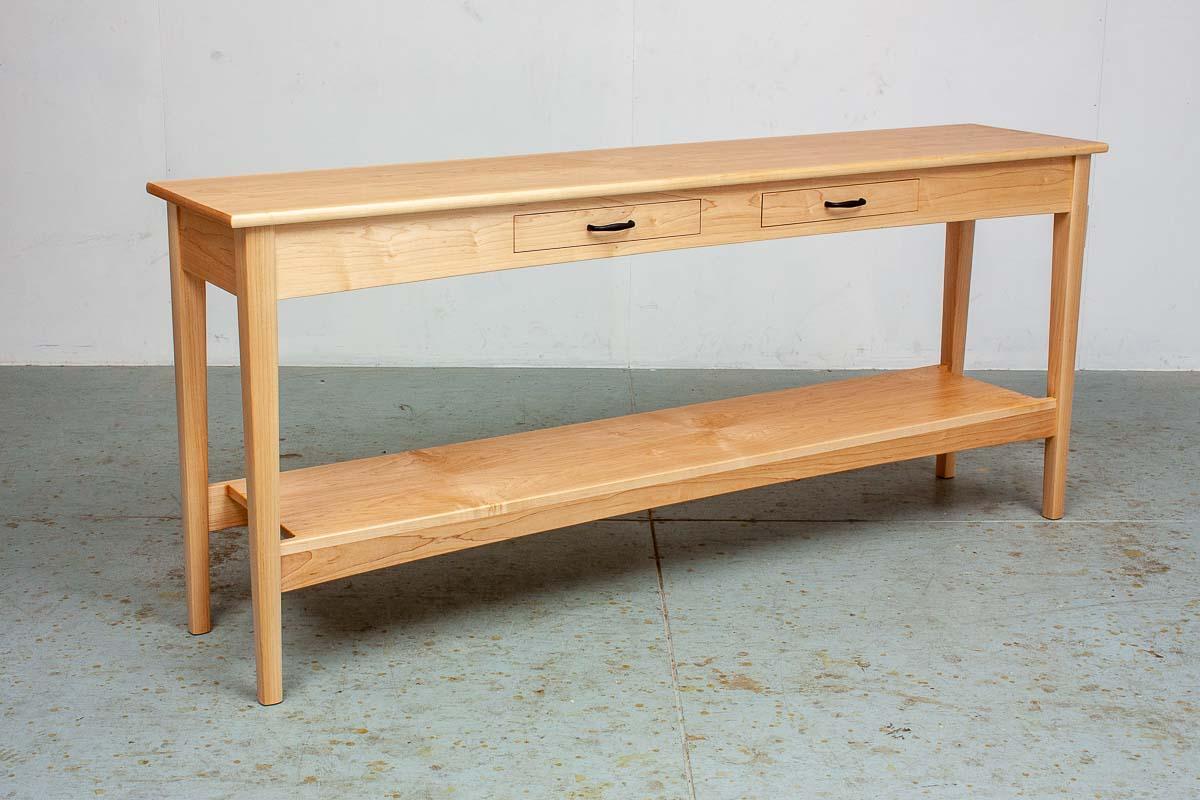 Table behind the couch