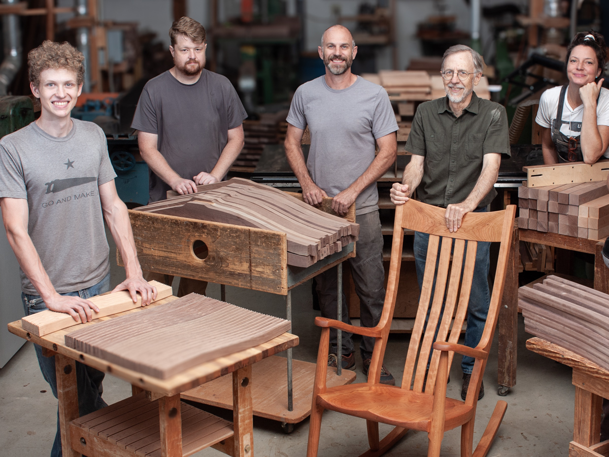Craftsmen in Shop with Finished Rocking chair and Dining Chair parts