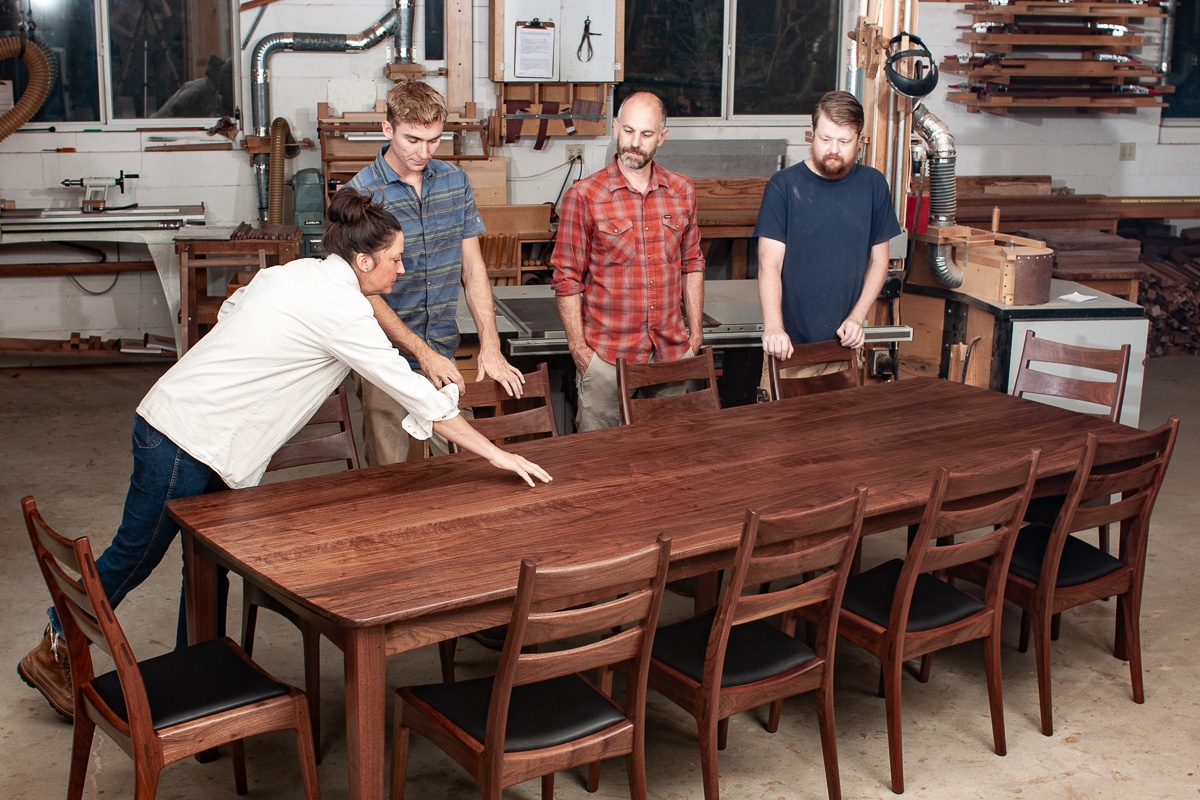 Staff in the Shop with a Phillips Table