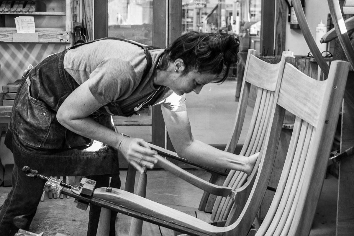 Autumn assembling a rocking chair arm