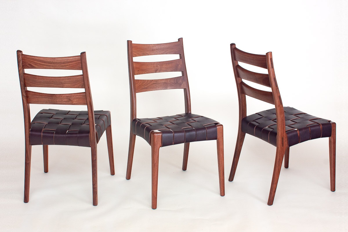 Three Webb Chairs. Strapped Seat. Each angle different