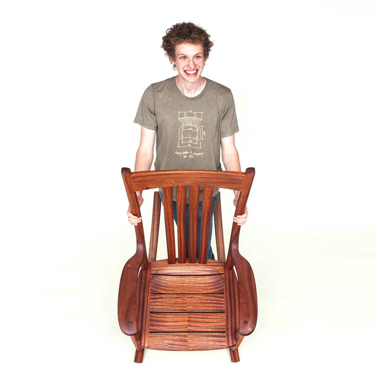 Peter showing an African Mahogany Porch Rocker