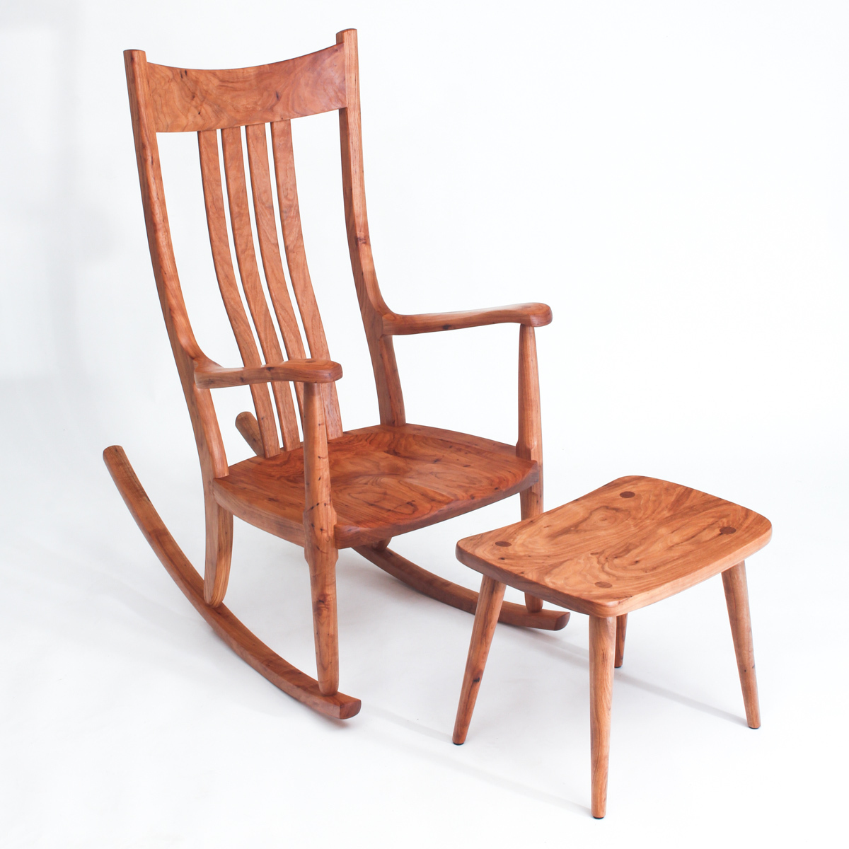 Matching pecan set, footstool and rocking chair, sold together.