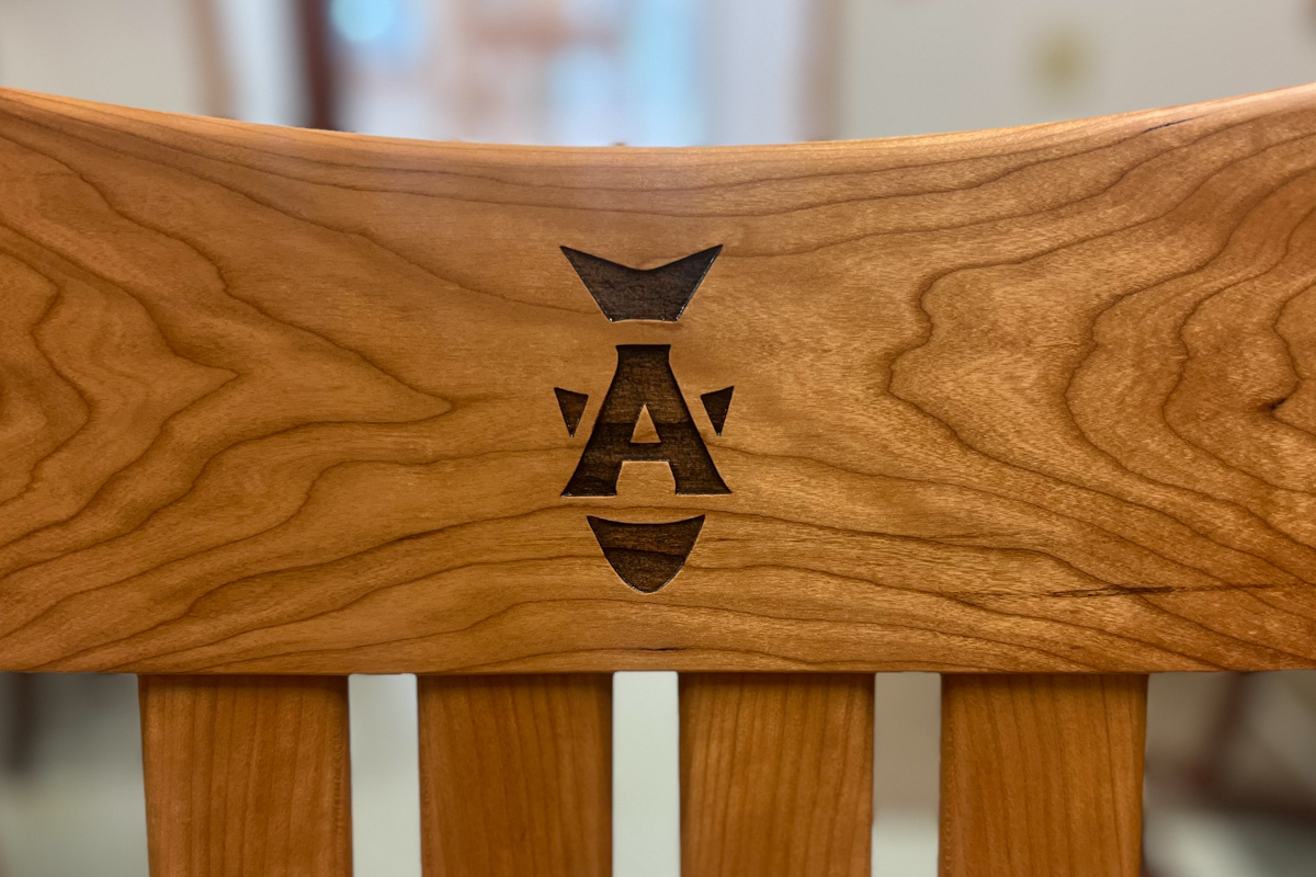 custom logo engraving on wooden rocking chair