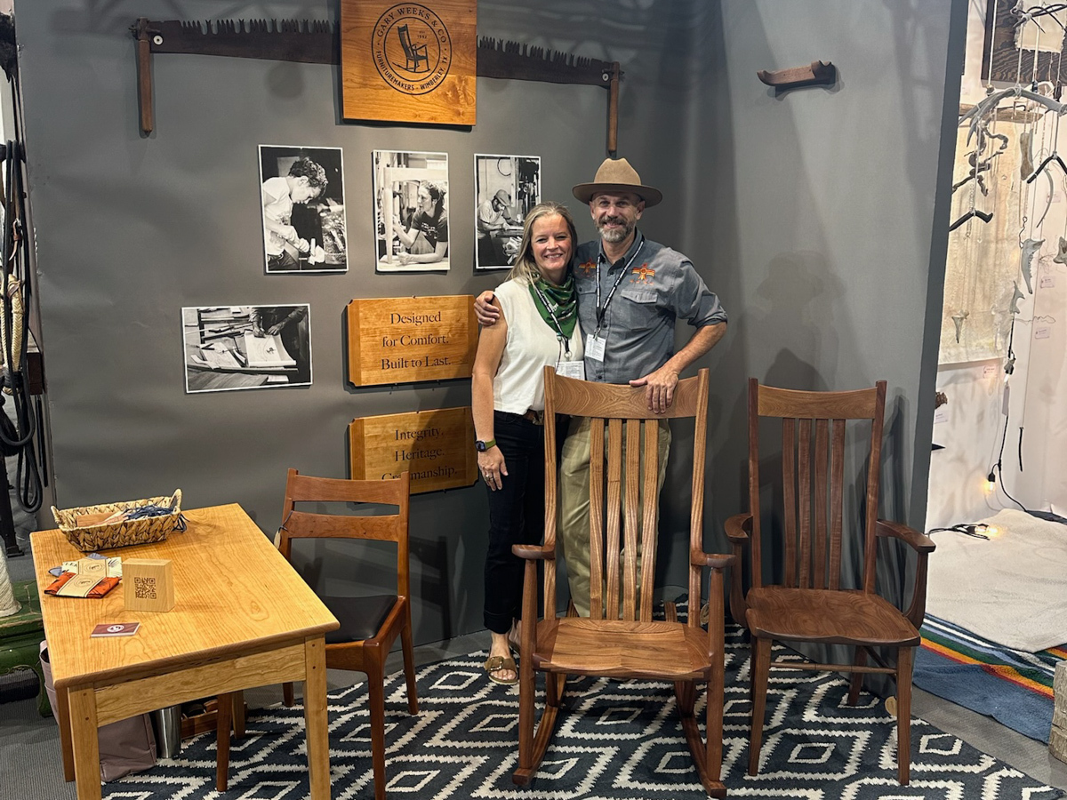 Austin and Robin in the booth at the Western Design Conference in Bozeman, Montana.