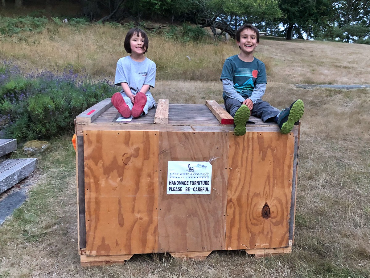 Two kids on a Crate