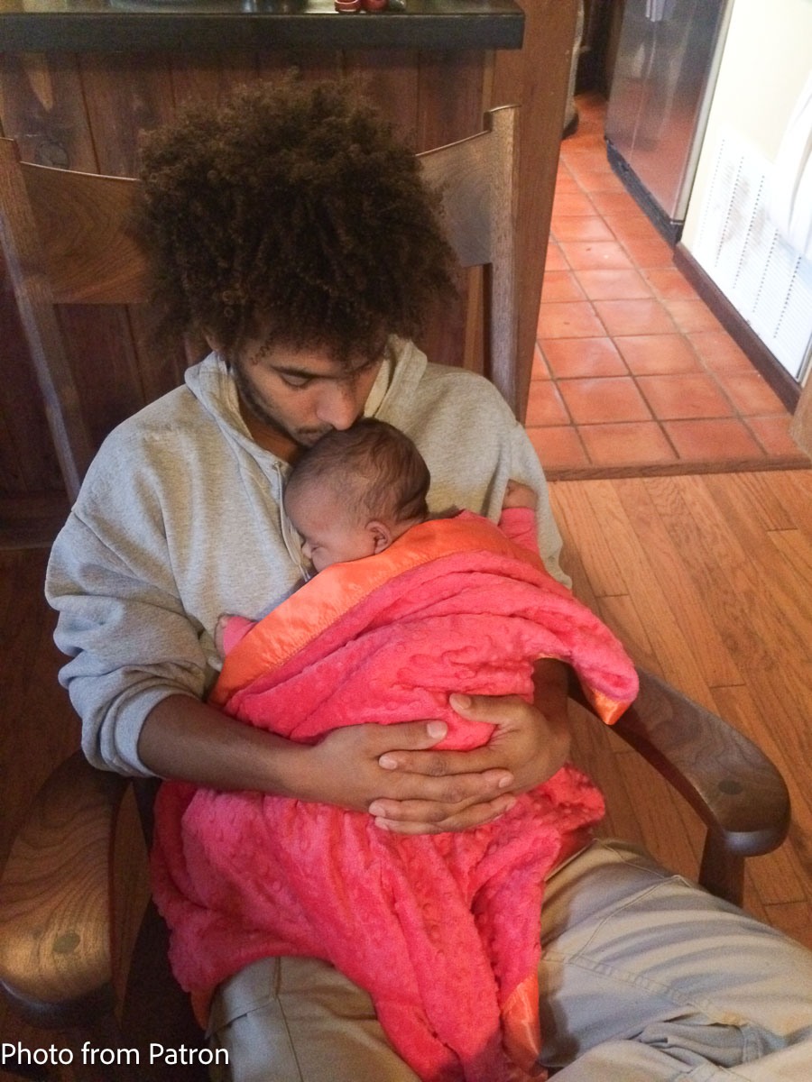 Dad and baby in rocking chair