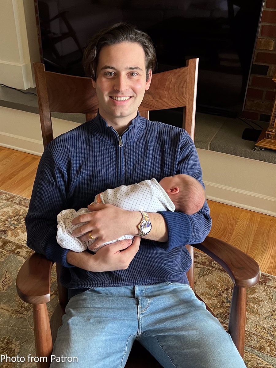 father and baby in rocking chair