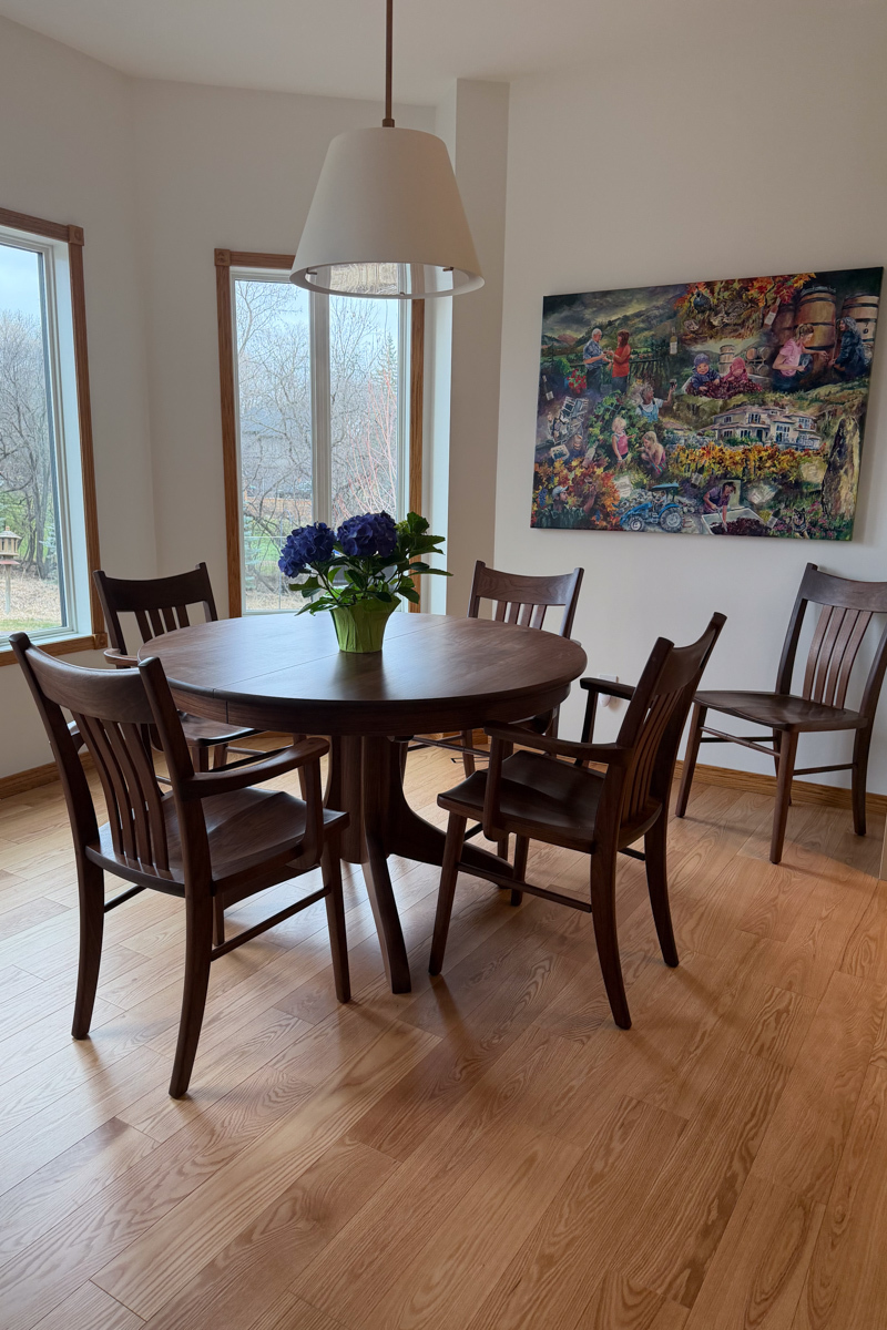 patron photo, Wilson Dining Chairs, Johnson Pedestal Table, walnut