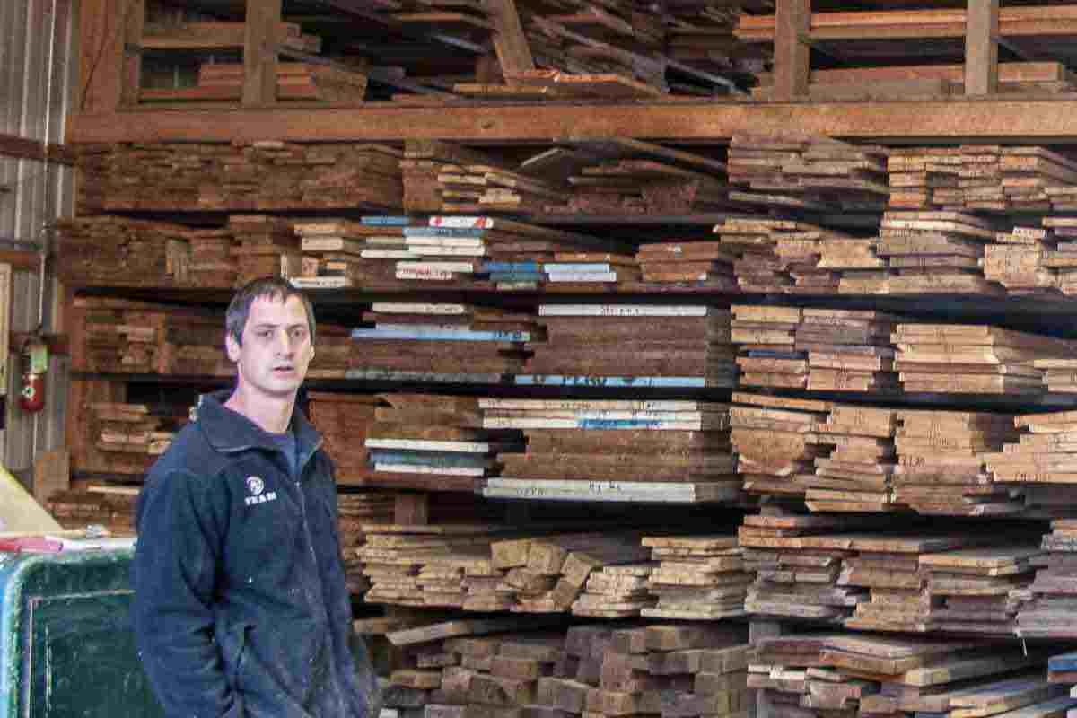 Myron by lumber bins