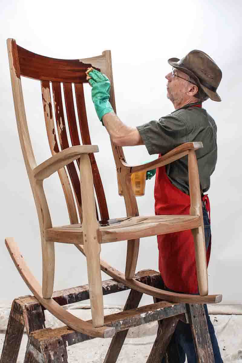 Gary oiling porch rocker