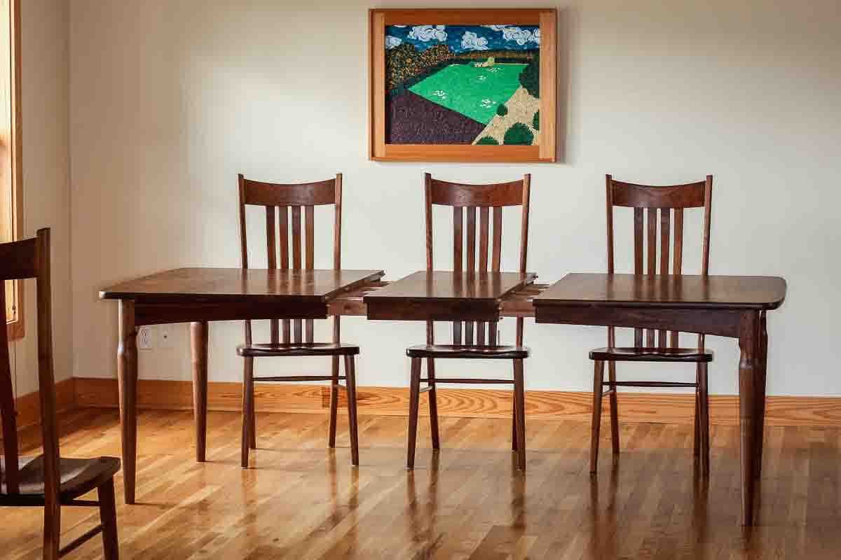 Paschall extension dining table open for one leaf