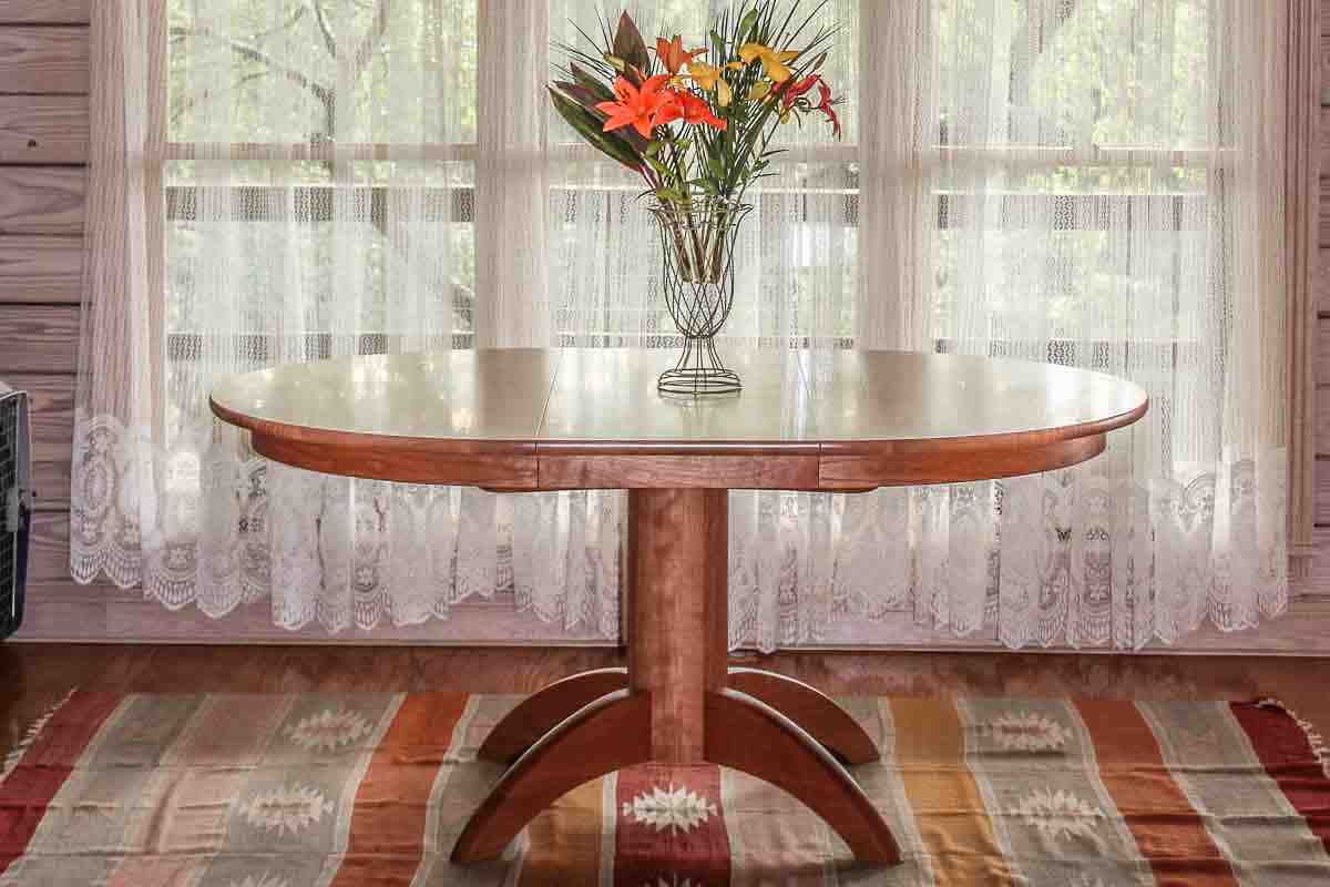 Mendelsohn table in setting by window