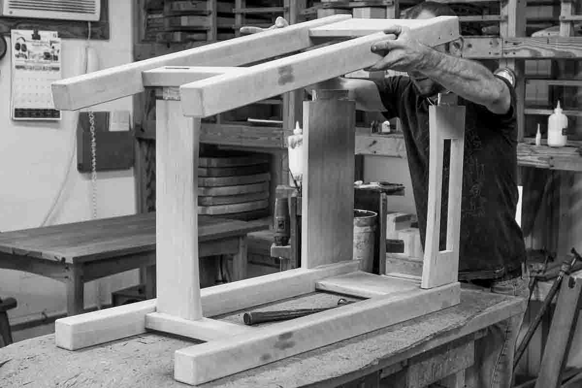 Aaron assembling standup desk