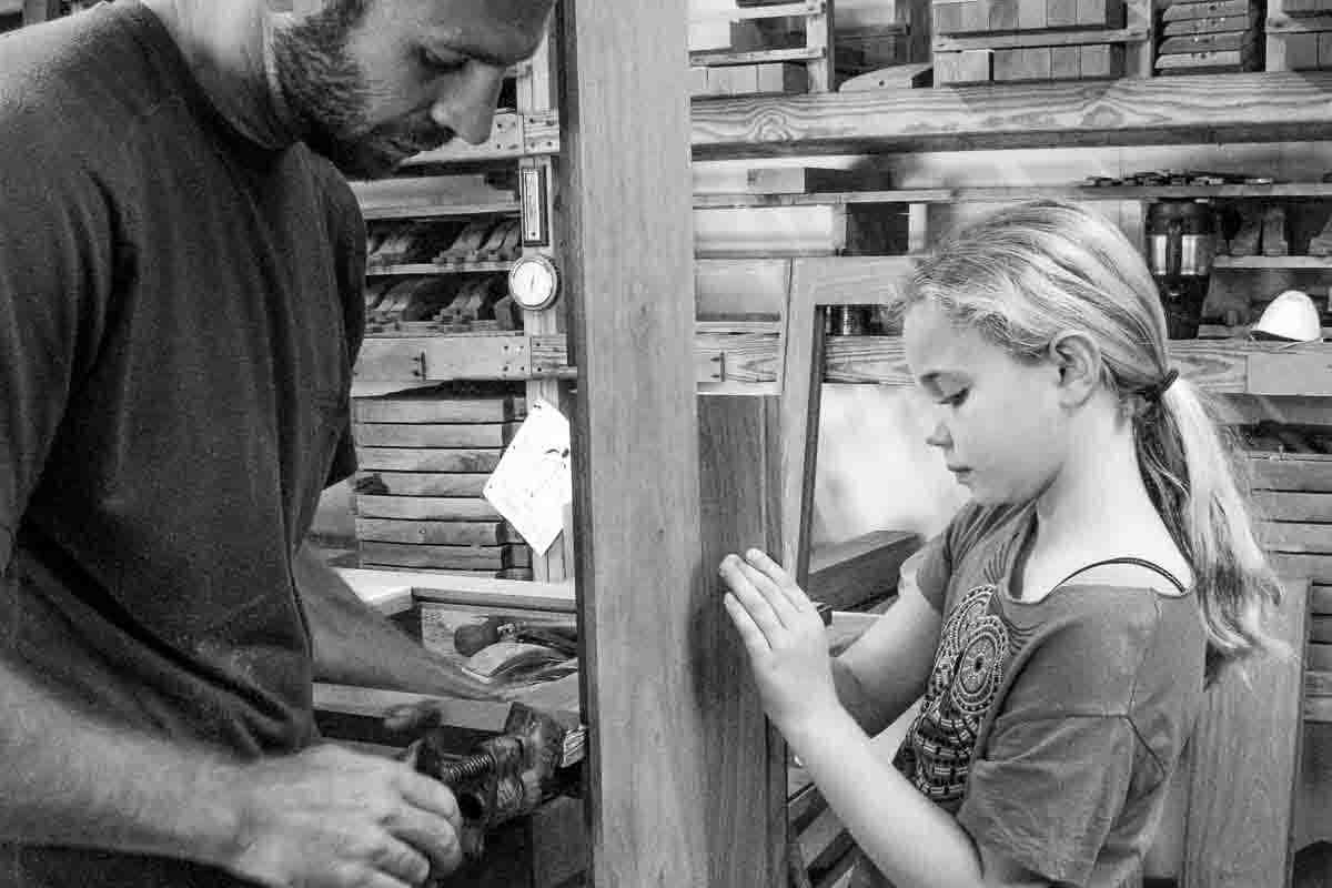 Austin and Bela assembling a cabinet