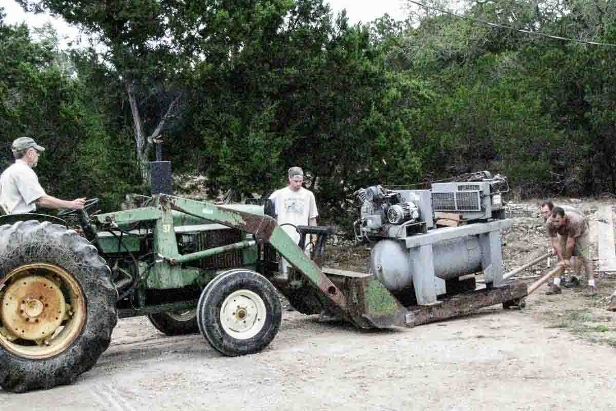 tractor moving air compressor