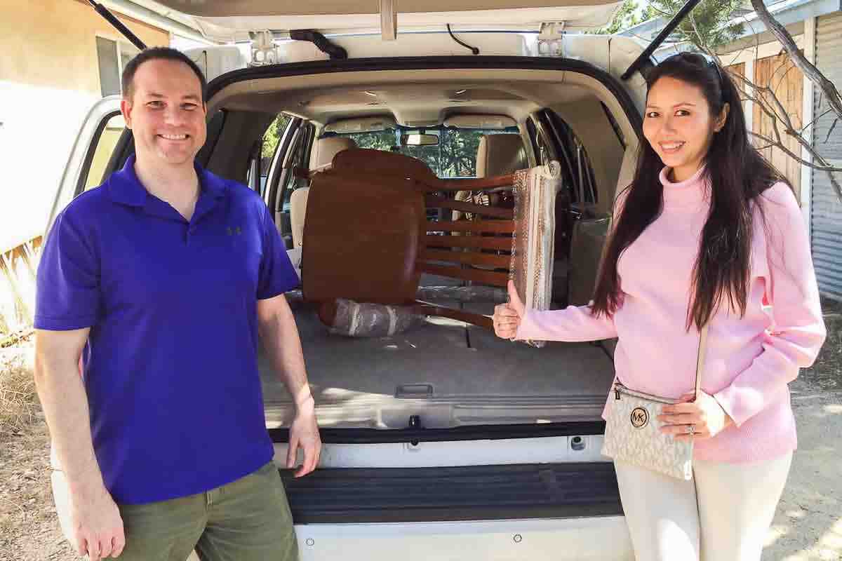 patrons picking up a rocking chair before the baby comes