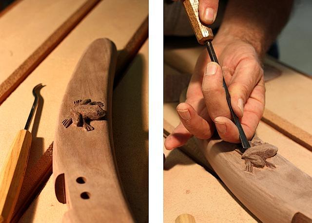 carving a frog on a rocker back leg