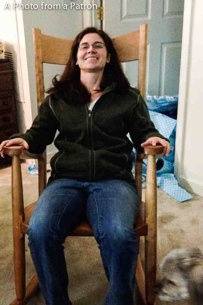 patron in rocking chair